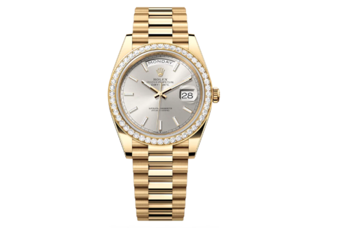 Day-Date 40 in gold with a silver dial diamond-set bezel